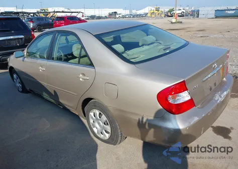 2003 Toyota Camry Le from USA, damaged, VIN 4T1BE32KX3U181028